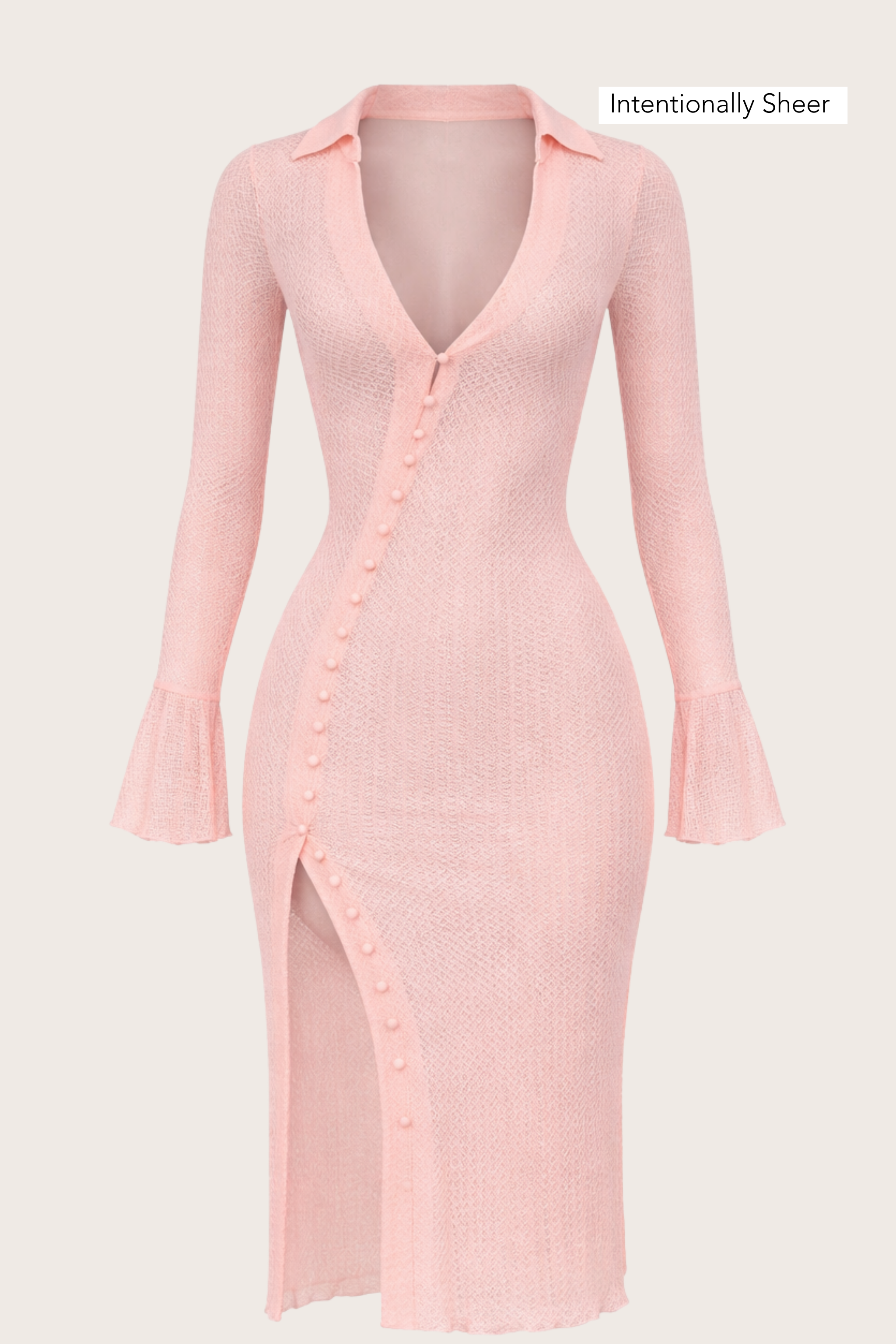 Pink dress with long sleeves and a button detail on a light gray background